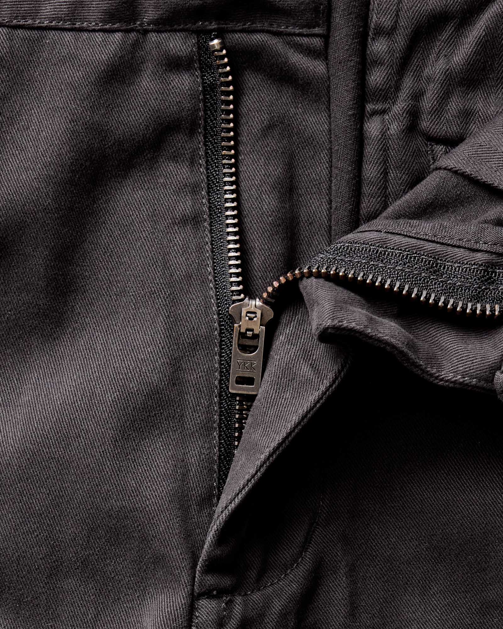 material shot of the zipper on The Straight Foundation Pant in Organic Faded Black, Bottoms by Taylor Stitch