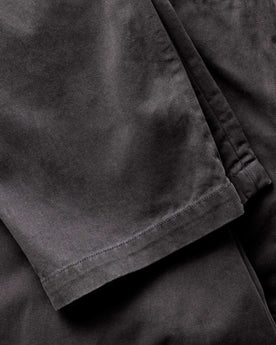 material shot of the hem on The Straight Foundation Pant in Organic Faded Black, Bottoms by Taylor Stitch