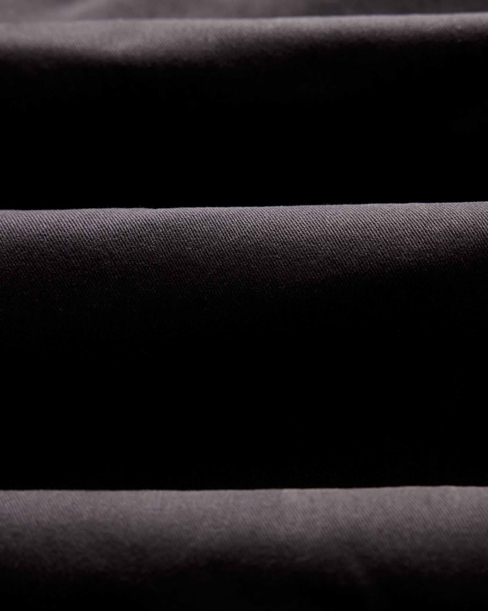 material shot of the fabric on The Straight Foundation Pant in Organic Faded Black, Bottoms by Taylor Stitch
