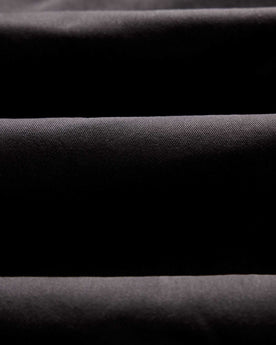 material shot of the fabric on The Straight Foundation Pant in Organic Faded Black, Bottoms by Taylor Stitch
