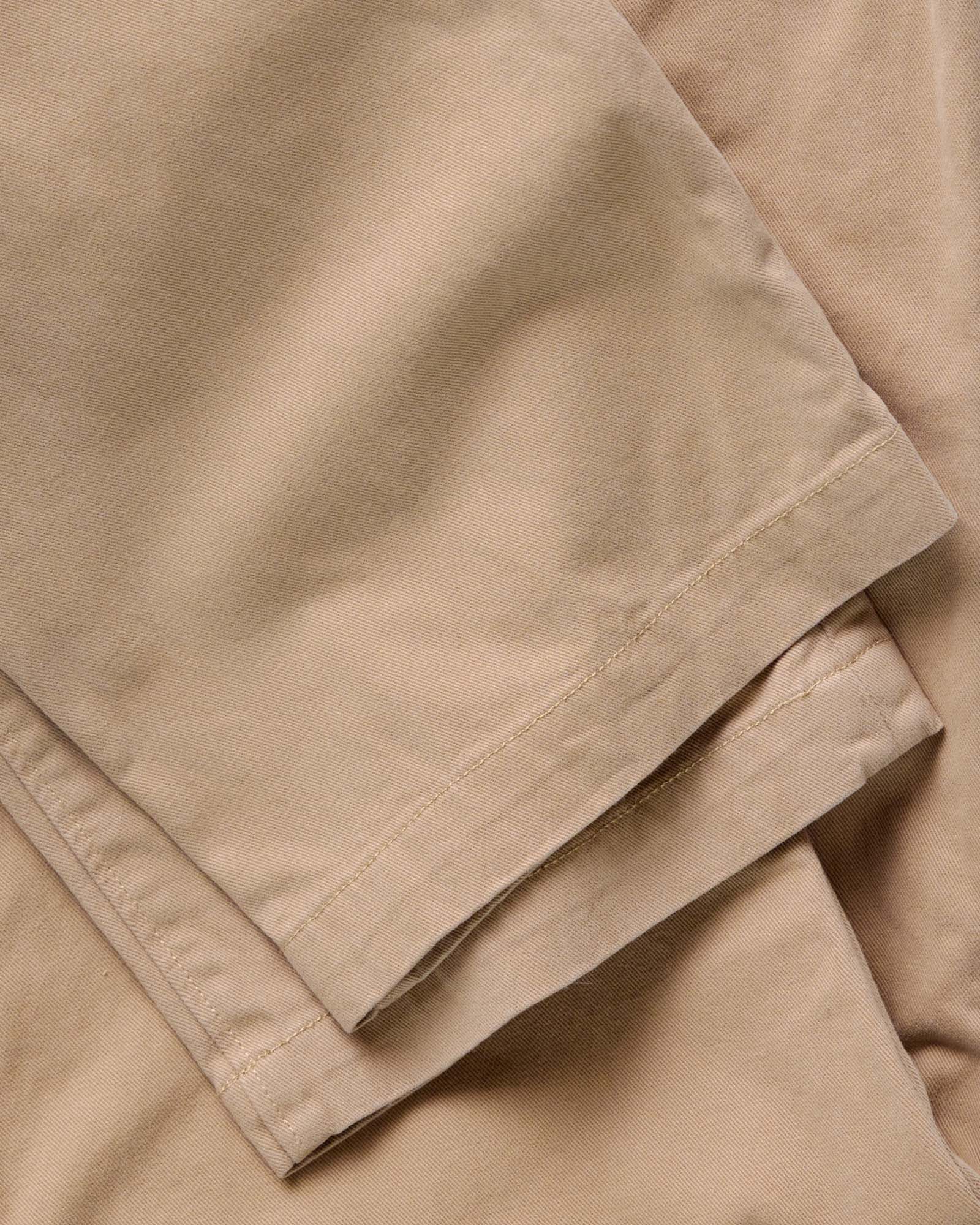 material shot of the hem on The Straight Foundation Pant in Organic Khaki, Bottoms by Taylor Stitch