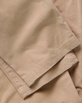 material shot of the hem on The Straight Foundation Pant in Organic Khaki, Bottoms by Taylor Stitch