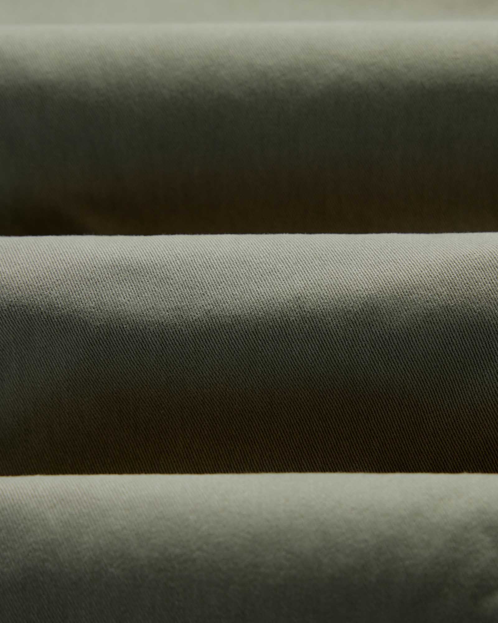 material shot of the fabric on The Straight Foundation Pant in Organic Smoked Olive, Bottoms by Taylor Stitch