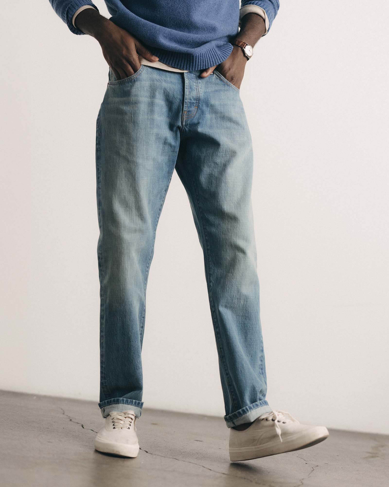 fit model walking wearing The Straight Jean in Light Wash Organic Selvedge, Bottoms by Taylor Stitch