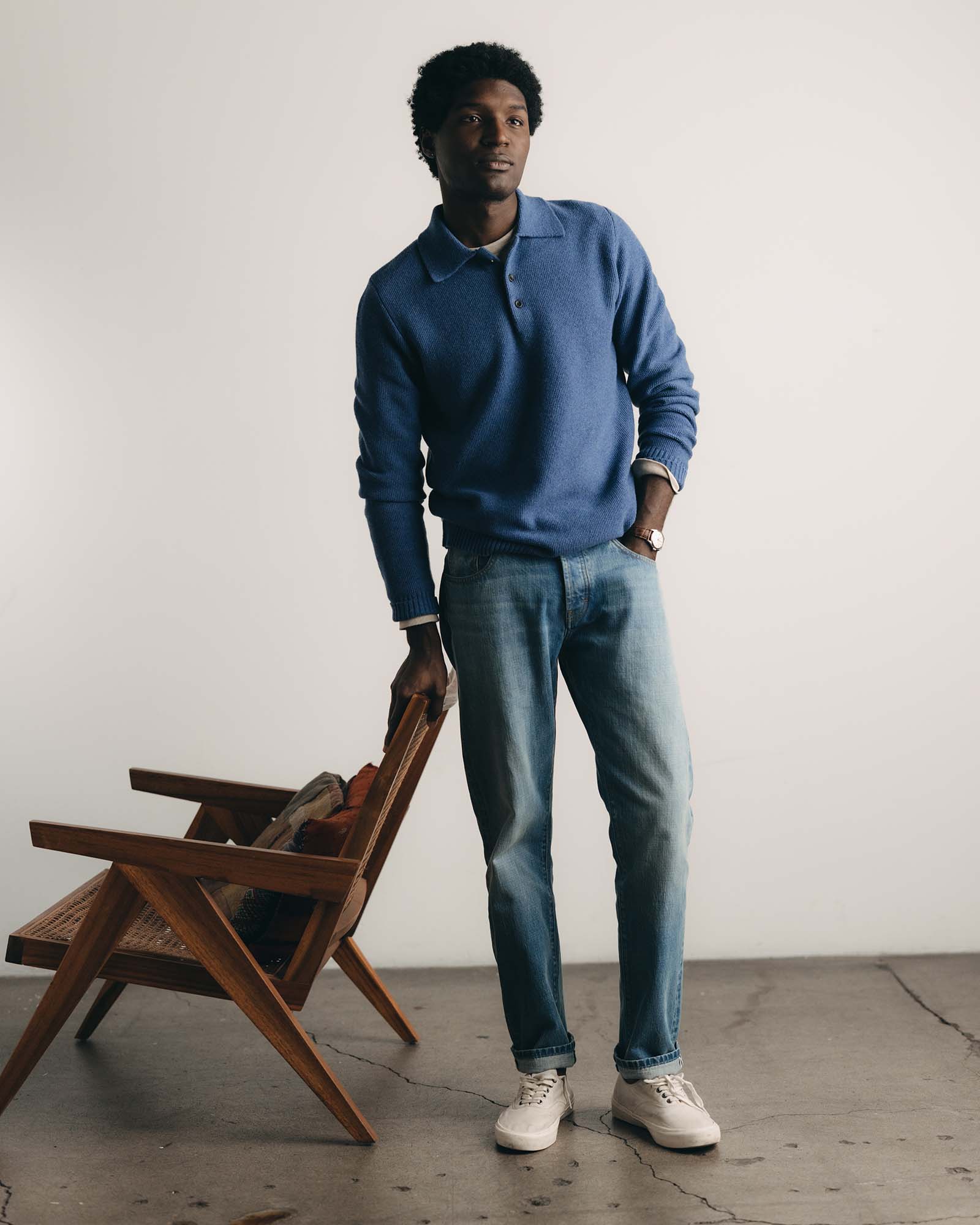 fit model posing in The Straight Jean in Light Wash Organic Selvedge, Bottoms by Taylor Stitch