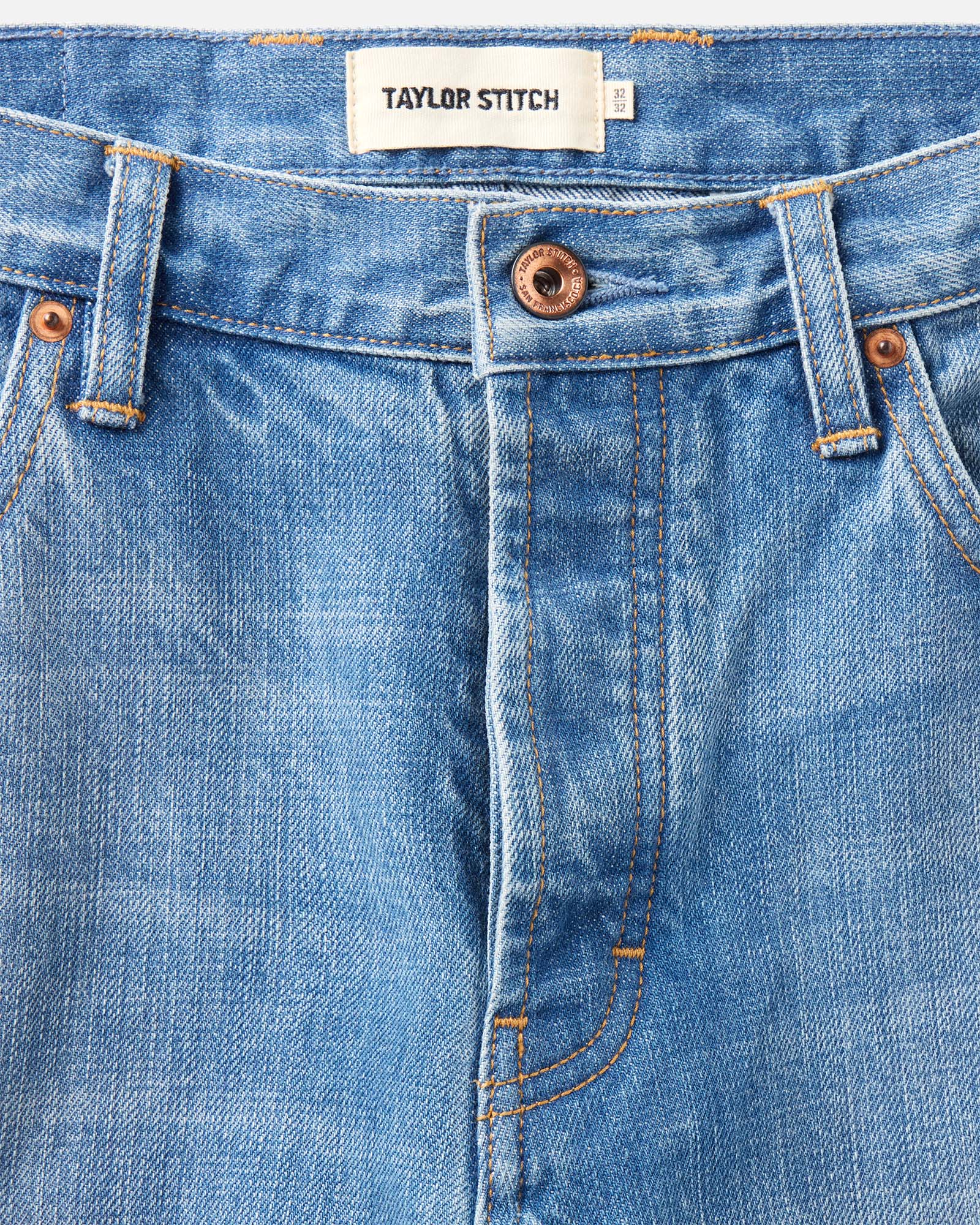 material shot of the waistband on The Straight Jean in Light Wash Organic Selvedge, Bottoms by Taylor Stitch