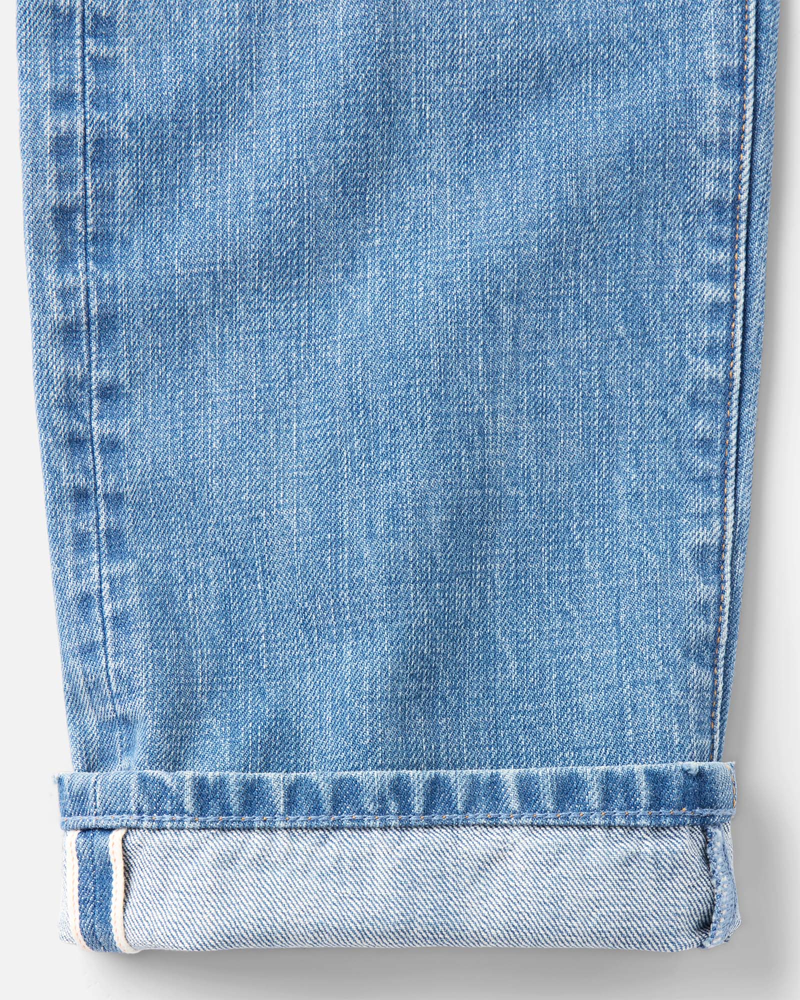 material shot of the cuff on The Straight Jean in Light Wash Organic Selvedge, Bottoms by Taylor Stitch