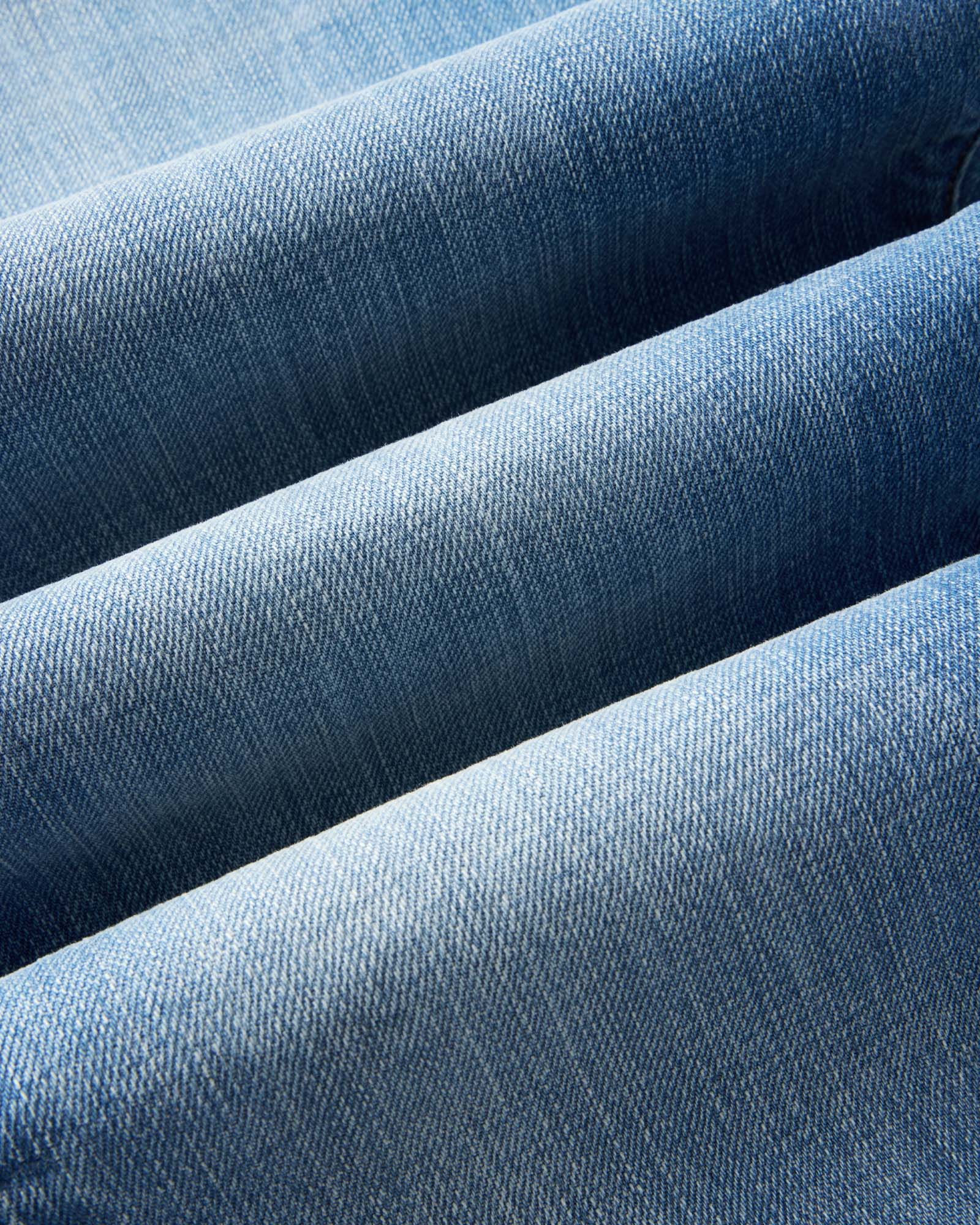 material shot of the fabric on The Straight Jean in Light Wash Organic Selvedge, Bottoms by Taylor Stitch