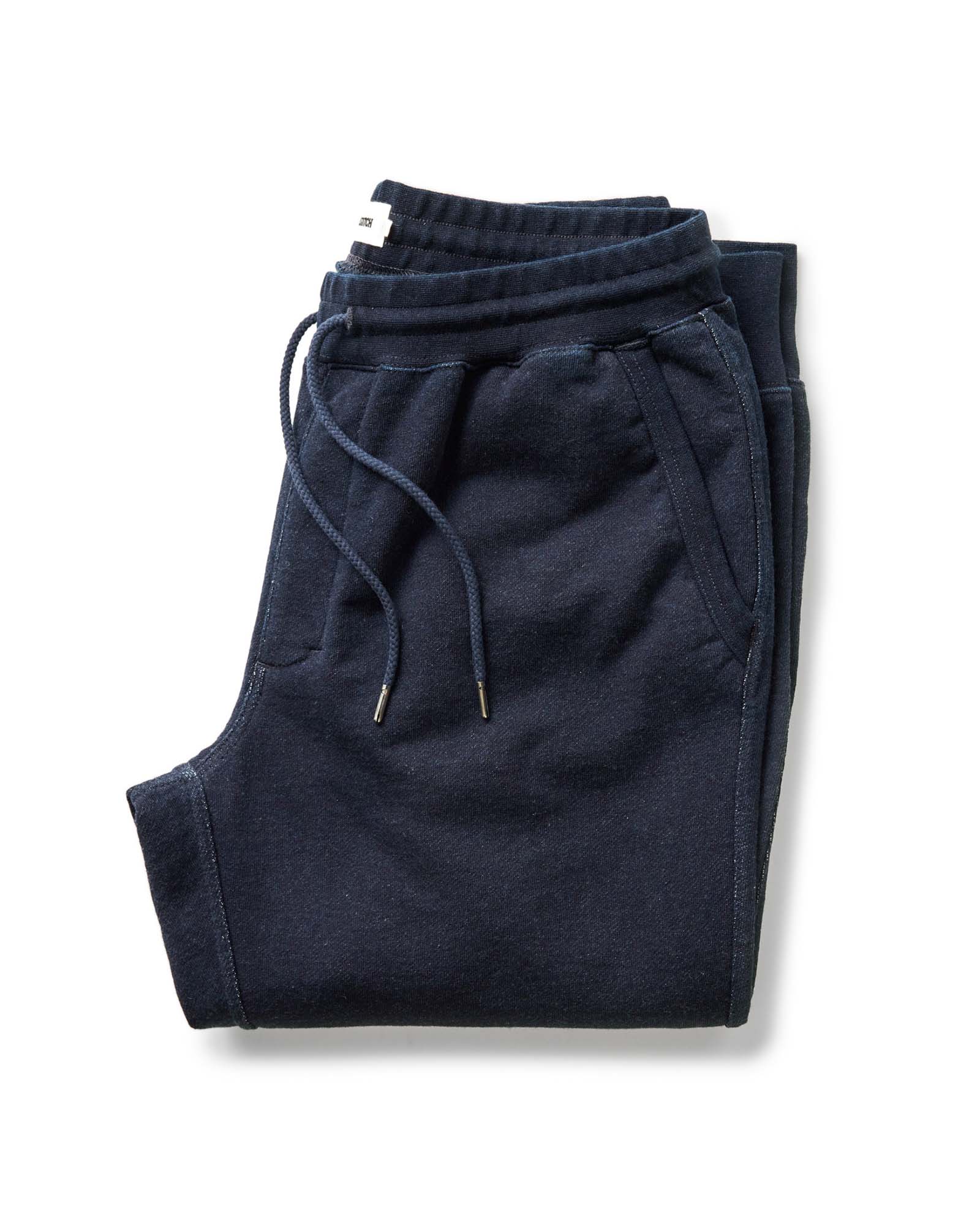 folded flatlay of The Sunset Pant in Rinsed Indigo Terry, Bottoms by Taylor Stitch