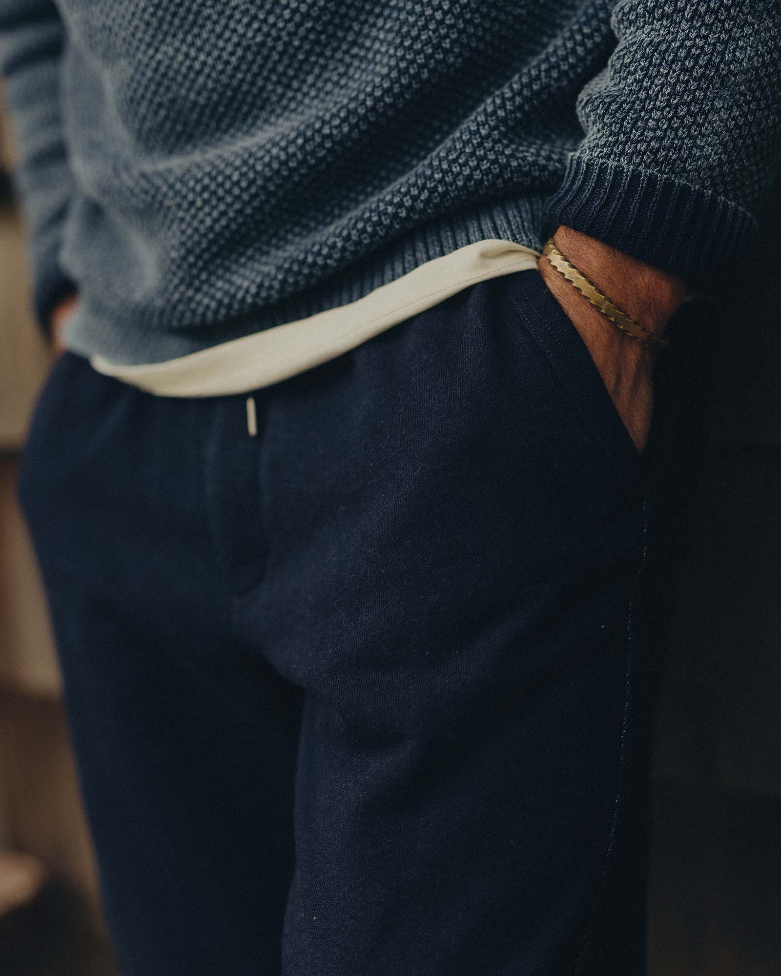 fit model posing in The Sunset Pant in Rinsed Indigo Terry, Bottoms by Taylor Stitch