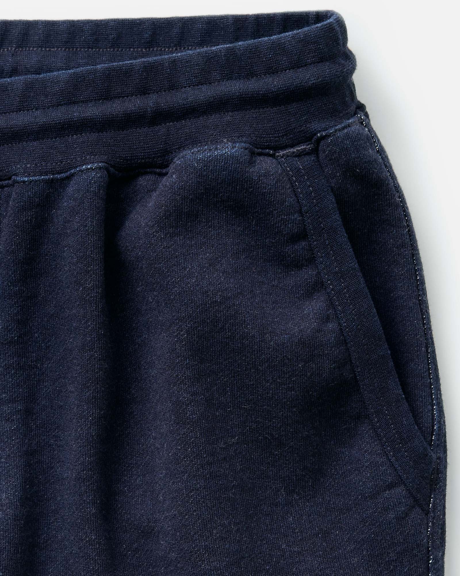 material shot of the pocket on The Sunset Pant in Rinsed Indigo Terry, Bottoms by Taylor Stitch