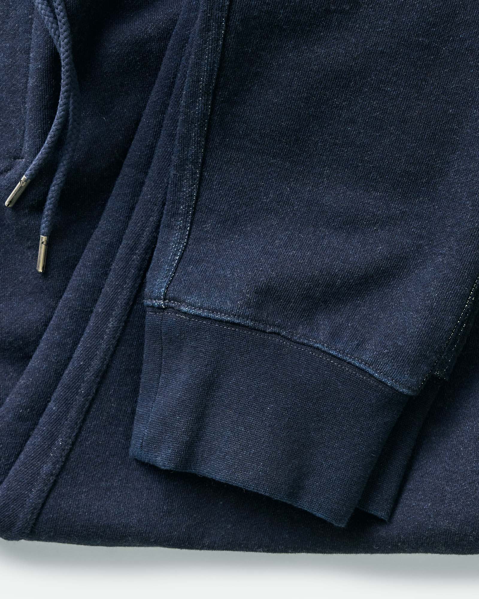 material shot of the hem on The Sunset Pant in Rinsed Indigo Terry, Bottoms by Taylor Stitch