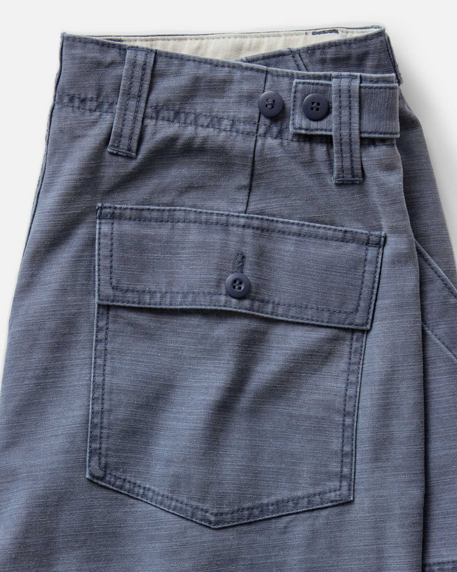 material shot of the back pocket on The Surplus Short in Dark Navy Reverse Sateen, Bottoms by Taylor Stitch