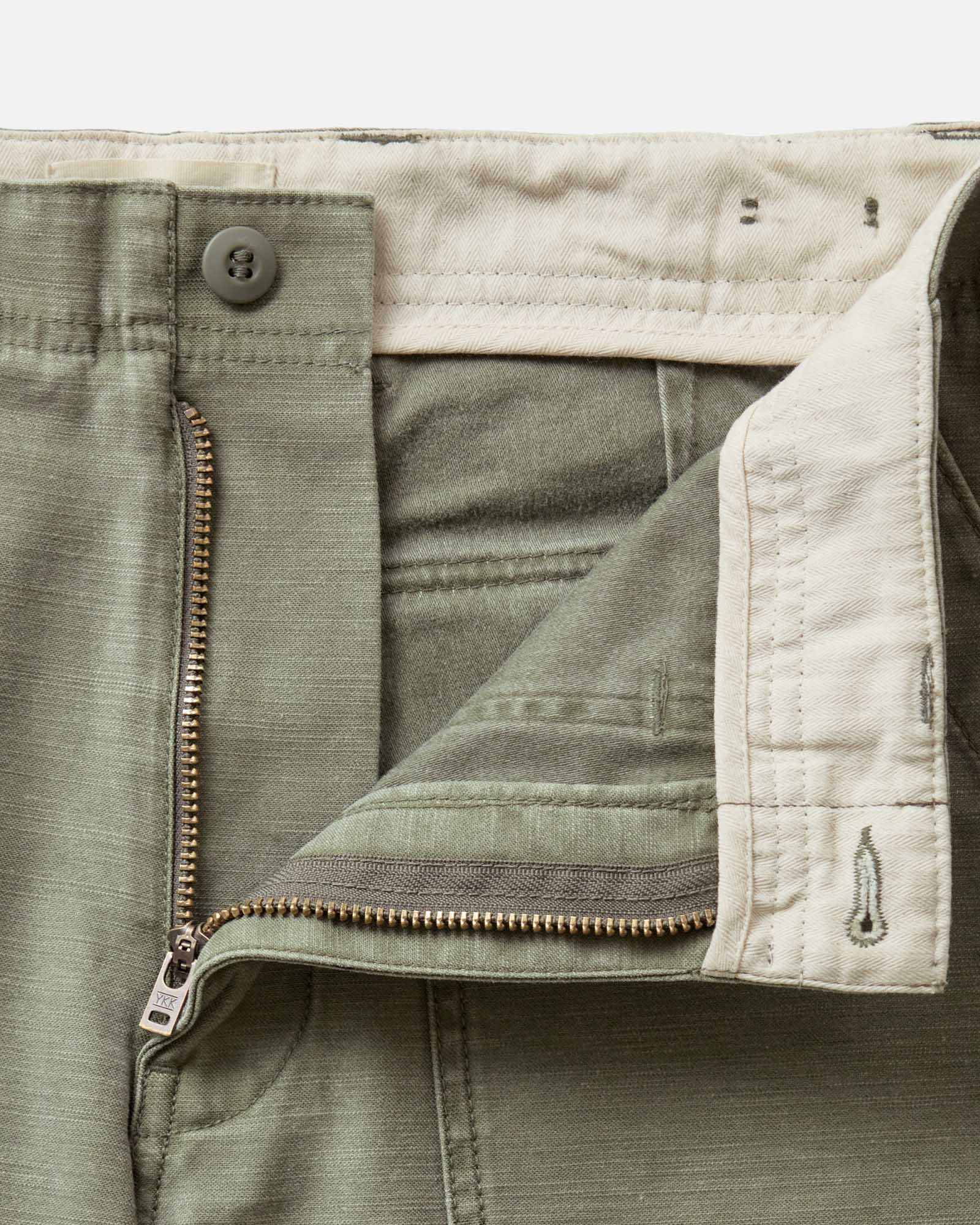 material shot of the zipper on The Surplus Short in Field Olive Reverse Sateen, Bottoms by Taylor Stitch