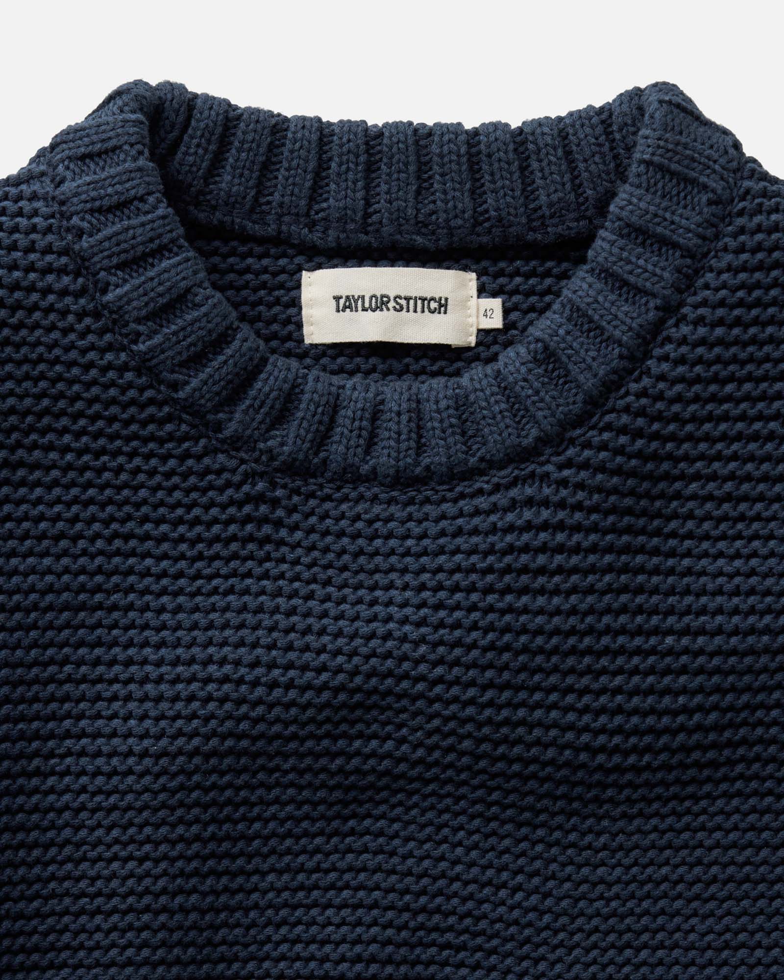 material shot of the collar on The Topsail Sweater in Dark Navy, Knits by Taylor Stitch
