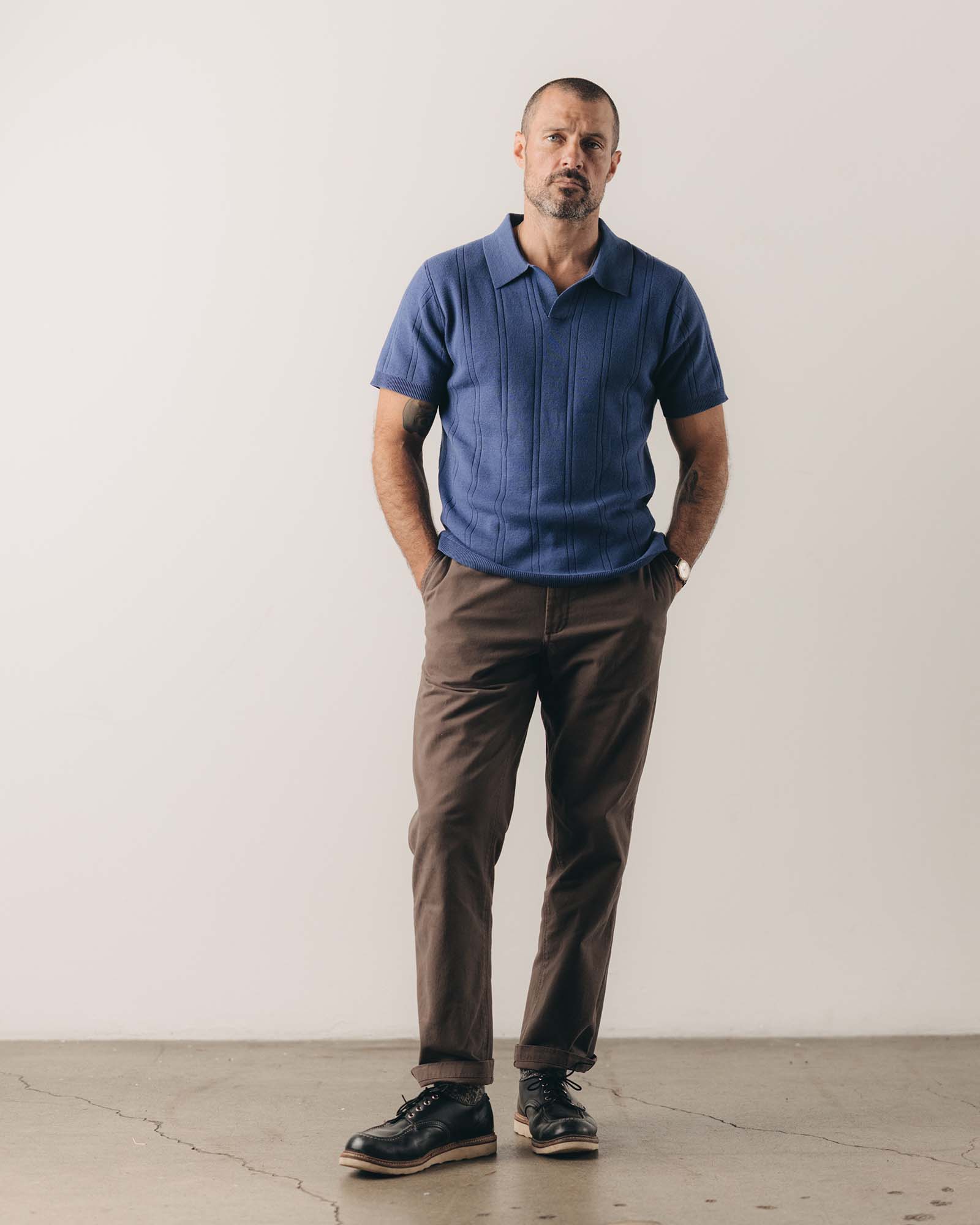 fit model wearing The Valencia Sweater Polo in Heather Clear Blue Rib, Knits by Taylor Stitch