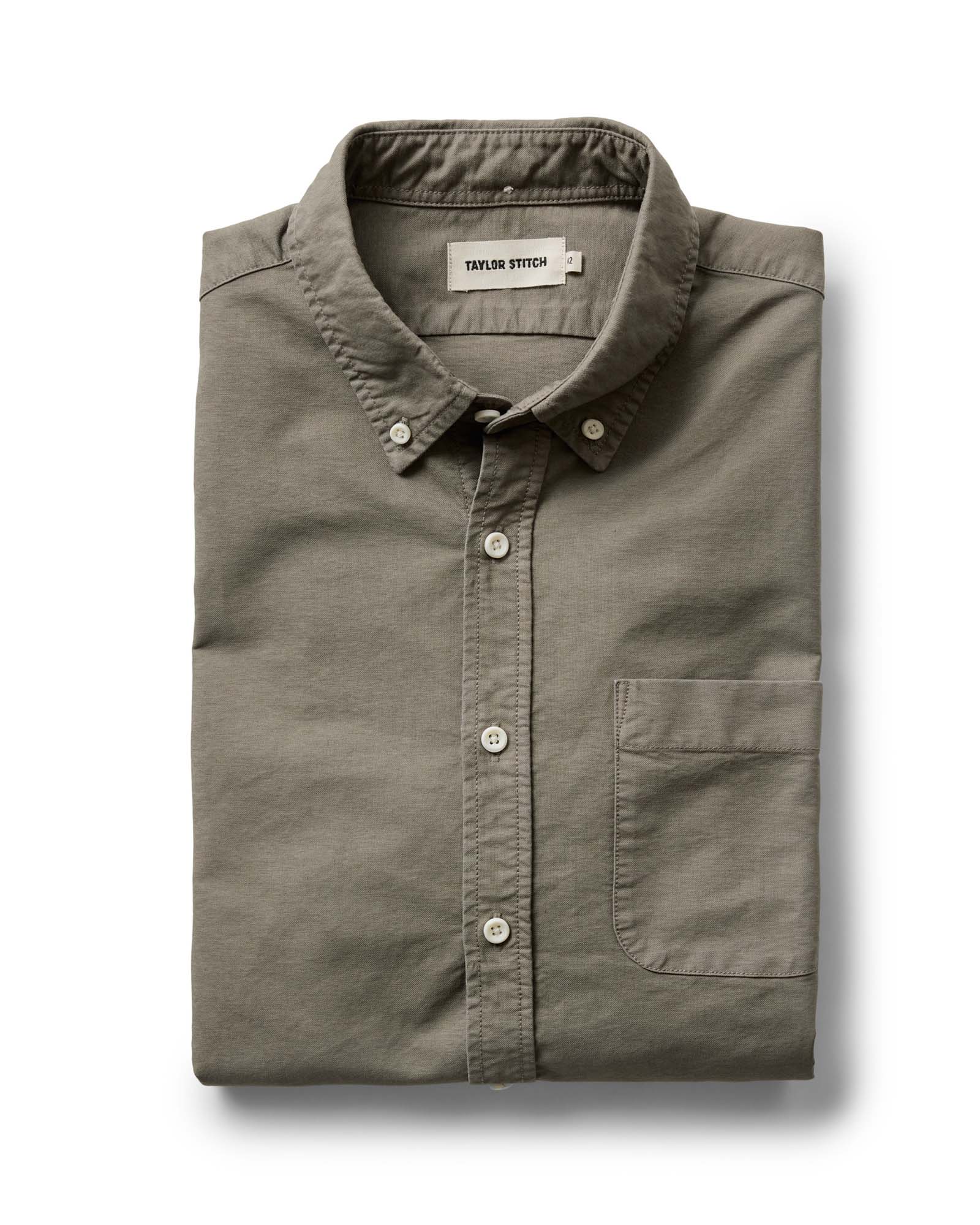 folded flatlay of The Jack in Smoked Olive Oxford, Wovens by Taylor Stitch