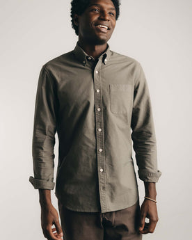 fit model posing in The Jack in Smoked Olive Oxford, Wovens by Taylor Stitch