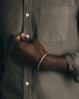 fit model showing off the back collar on The Jack in Smoked Olive Oxford, Wovens by Taylor Stitch