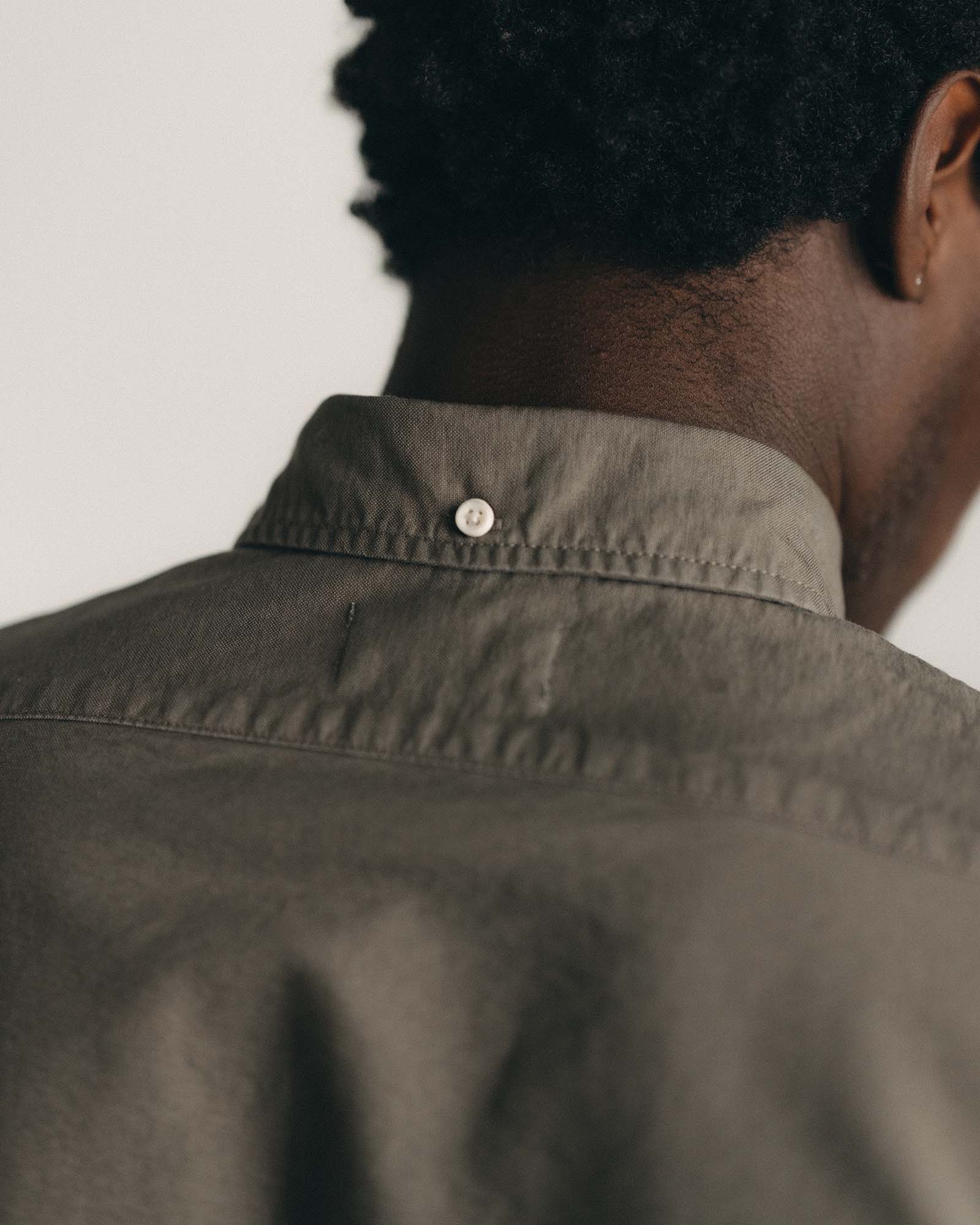 fit model standing wearing The Jack in Smoked Olive Oxford, Wovens by Taylor Stitch