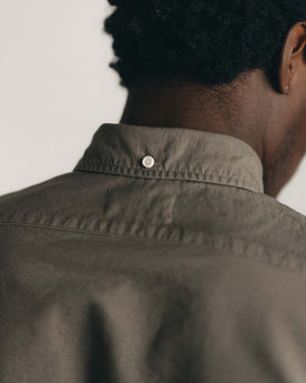 fit model standing wearing The Jack in Smoked Olive Oxford, Wovens by Taylor Stitch