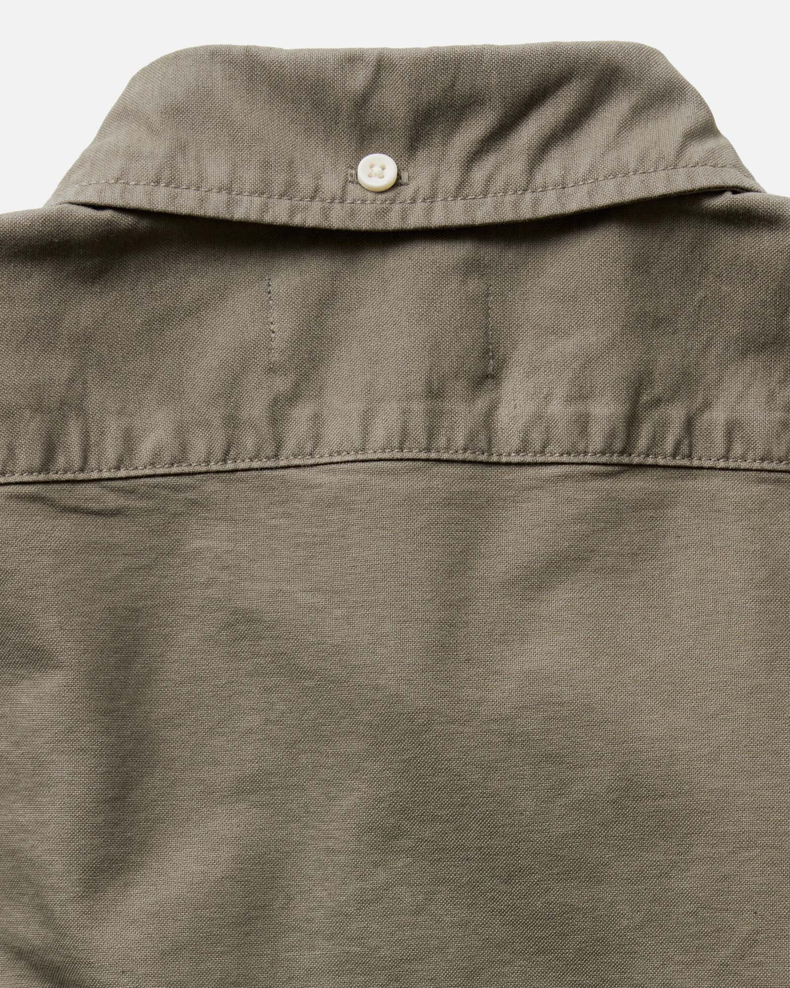 material shot of the buttons on The Jack in Smoked Olive Oxford, Wovens by Taylor Stitch