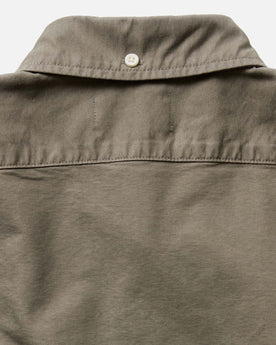 material shot of the buttons on The Jack in Smoked Olive Oxford, Wovens by Taylor Stitch