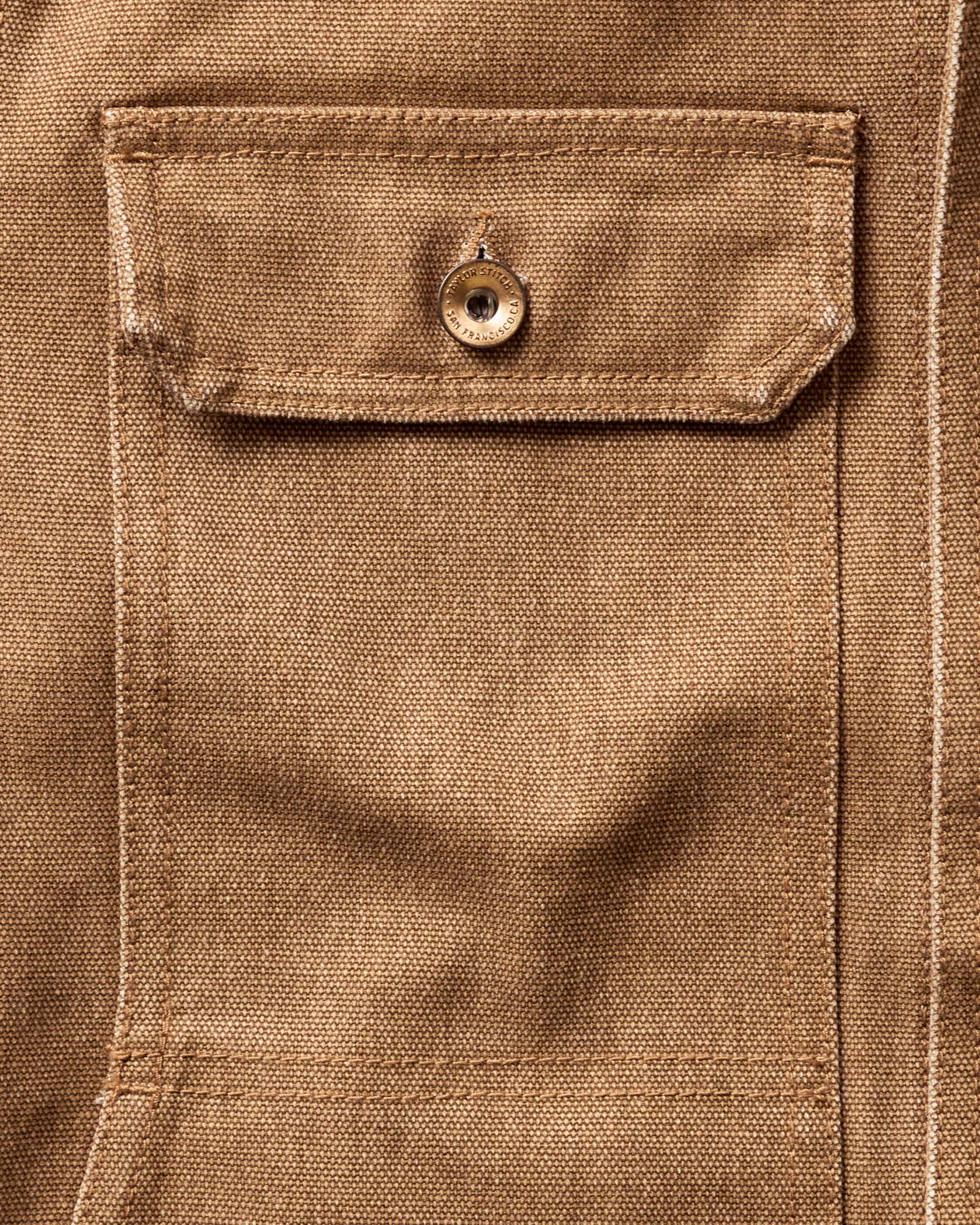 material shot of the pocket on The Longshore Jacket in Tobacco Chipped Canvas, Outerwear by Taylor Stitch
