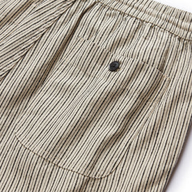 material shot of the rear button pocket on The Apres Short in Morita Stripe