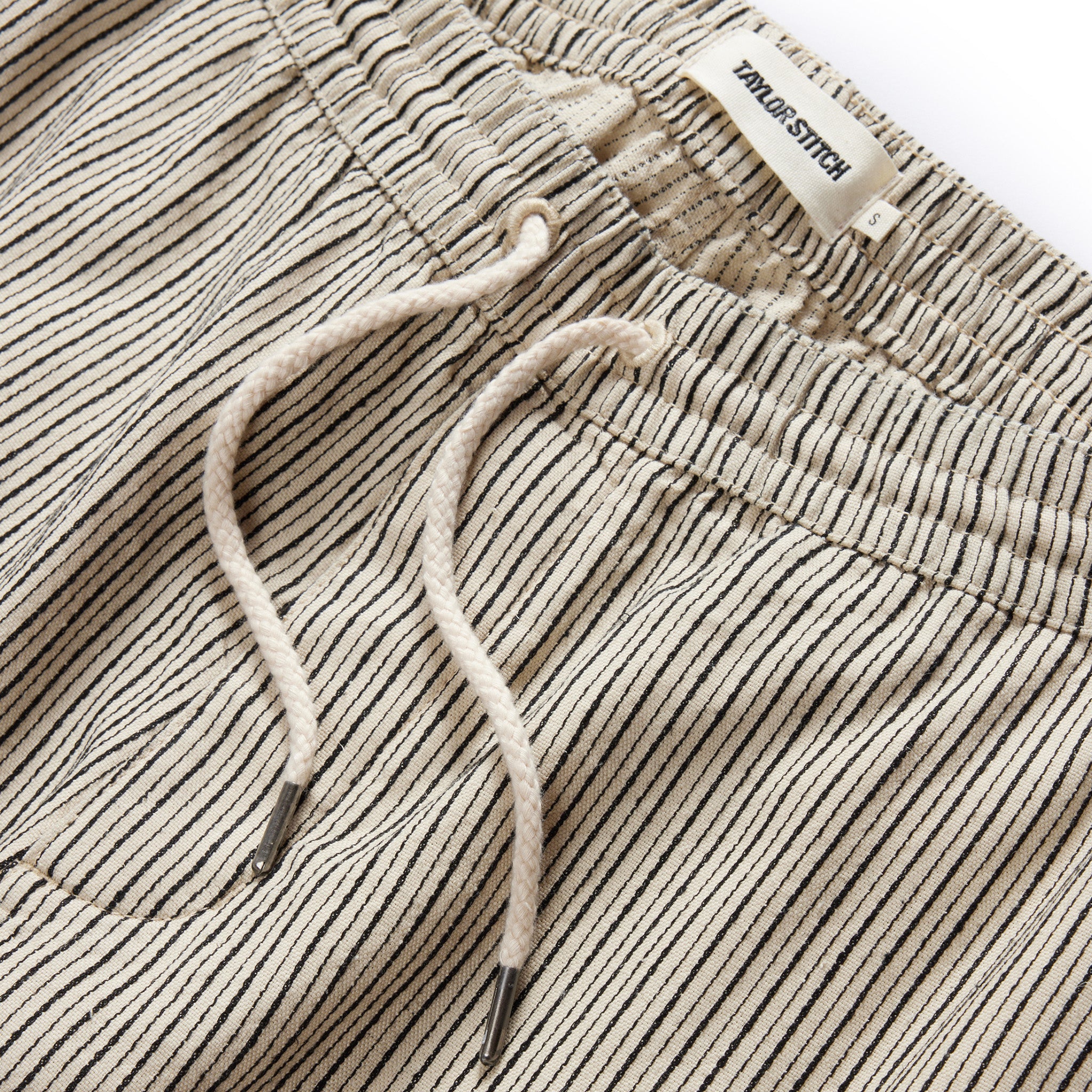 material shot of the drawcords on The Apres Short in Morita Stripe, Bottoms by Taylor Stitch