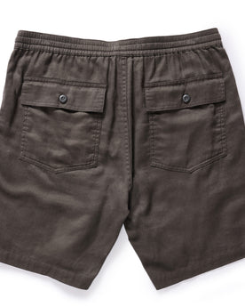 flatlay of The Apres Trail Short in Granite Double Cloth from the back, showing the back flap pockets, Bottoms by Taylor Stitch