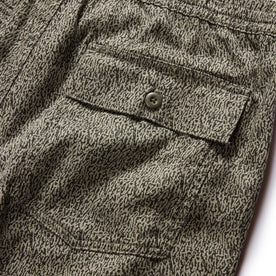 material shot of the back flap pockets on The Apres Trail Short in Static Camo Double Cloth