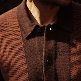 fit model showing the collar and texture on the front of The Button Down Polo in Morita Seed Stitch