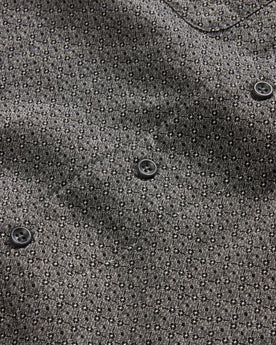 material shot of the charcoal buttons on The Conrad in Black Indigo Jacquard Floral, Wovens by Taylor Stitch