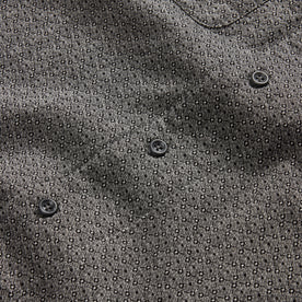 material shot of the charcoal buttons on The Conrad in Black Indigo Jacquard Floral