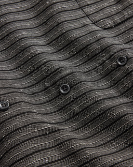 material shot of the buttons on The Conrad in Black Indigo Slub Stripe, Wovens by Taylor Stitch