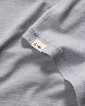 material shot of the logo on The Cotton Hemp Tee in Tradewinds, Knits by Taylor Stitch