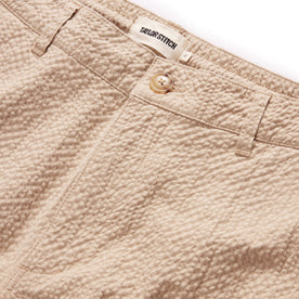 material shot of the button fly on The Easy Pant in Heather Oat Seersucker