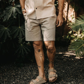 fit model with his hand in the pocket of The Easy Short in Heather Eucalyptus Seersucker