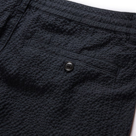 material shot of the rear pocket on The Easy Short in Heather Navy Seersucker
