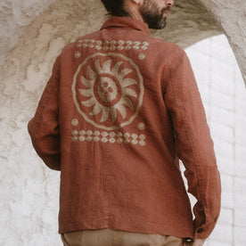 fit model showing the embroidery on the back of The Embroidered Ojai in Dried Guajillo Hemp