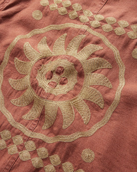 material shot of the embroidery on the back of The Embroidered Ojai in Dried Guajillo Hemp, Outerwear by Taylor Stitch