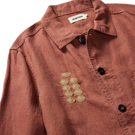 material shot of the embroidery on the right chest of The Embroidered Ojai in Dried Guajillo Hemp