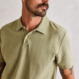 fit model showing off collar on The Herringbone Polo in Heather Sage