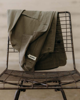 fit model buttoning up The Ojai Jacket in Organic Smoked Olive Foundation Twill, Outerwear by Taylor Stitch