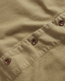 material shot of the horn buttons on The Short Sleeve Hawthorne in Sea Moss, Wovens by Taylor Stitch