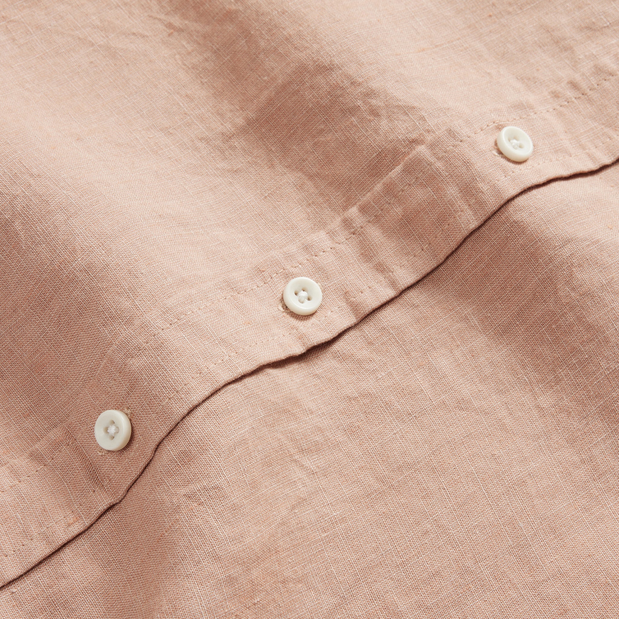 material shot of the buttons on The Short Sleeve California in Clay Hemp, Wovens by Taylor Stitch