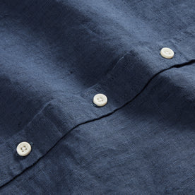 material shot of the natural buttons on The Short Sleeve California in Navy Hemp