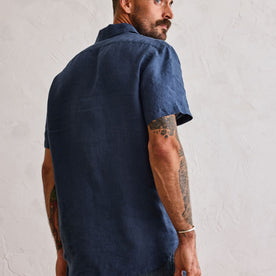 fit model showing the back of The Short Sleeve California in Navy Hemp