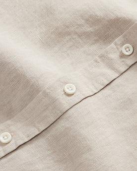material shot of the buttons on The Short Sleeve California in Sage Hemp, Wovens by Taylor Stitch